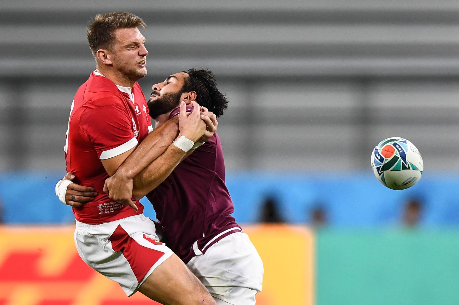 Georgia's wing Giorgi Kveseladze, right, tackles Wales' fly-half Dan Biggar during their Pool D match between at the City of Toyota Stadium on September 23.