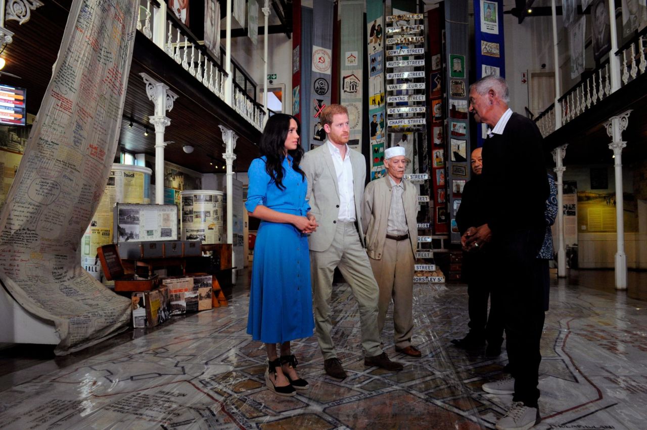 The Duke and Duchess are given a guided tour of the District Six Museum in Cape Town. District Six was an inner-city residential area where various communities and races lived side by side until 1966, when the apartheid government declared the area whites-only and 60,000 residents were forcibly removed and relocated.