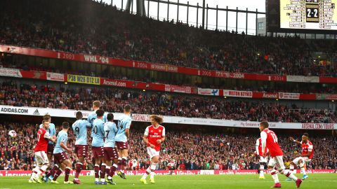 Emerick Aubameyang of Arsenal scores his team's scores his team's third goal against Villa.