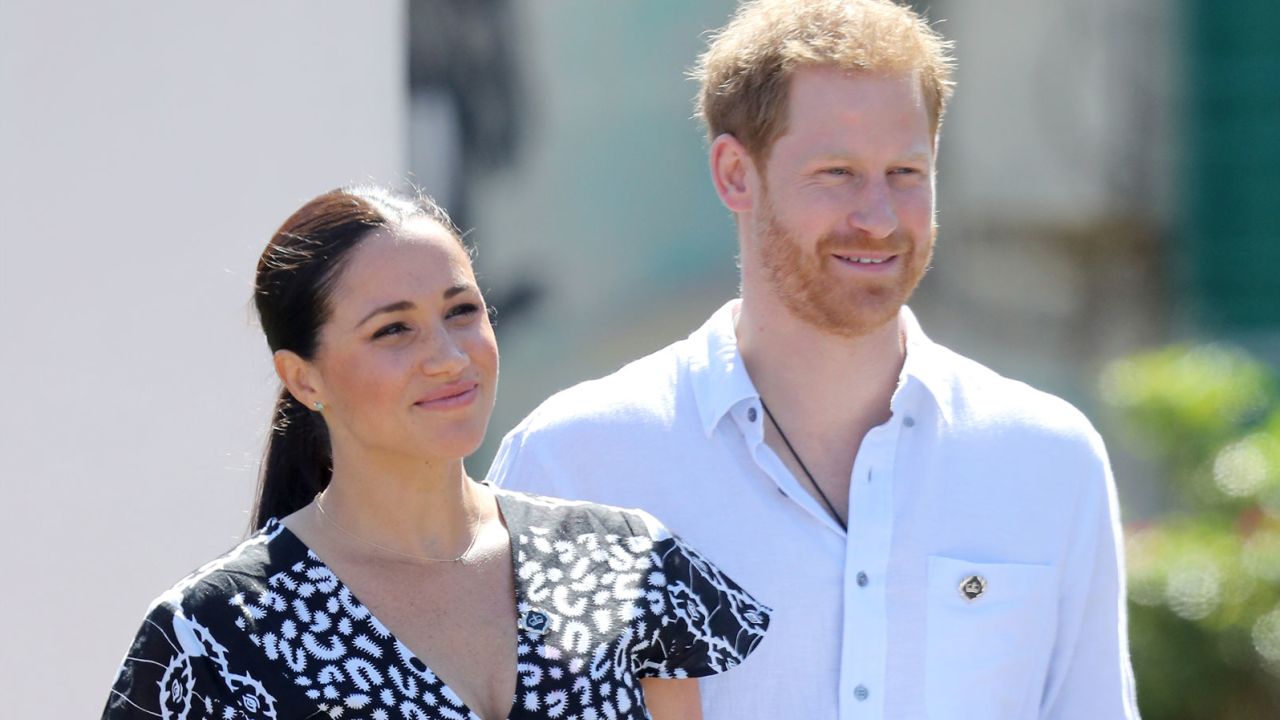 Meghan, Duchess of Sussex and Prince Harry, Duke of Sussex smile as they visit a Justice Desk initiative in Nyanga township, during their royal tour of South Africa on September 23, 2019 in Cape Town, South Africa. The Justice Desk initiative teaches children about their rights and provides self-defence classes and female empowerment training to young girls in the community.