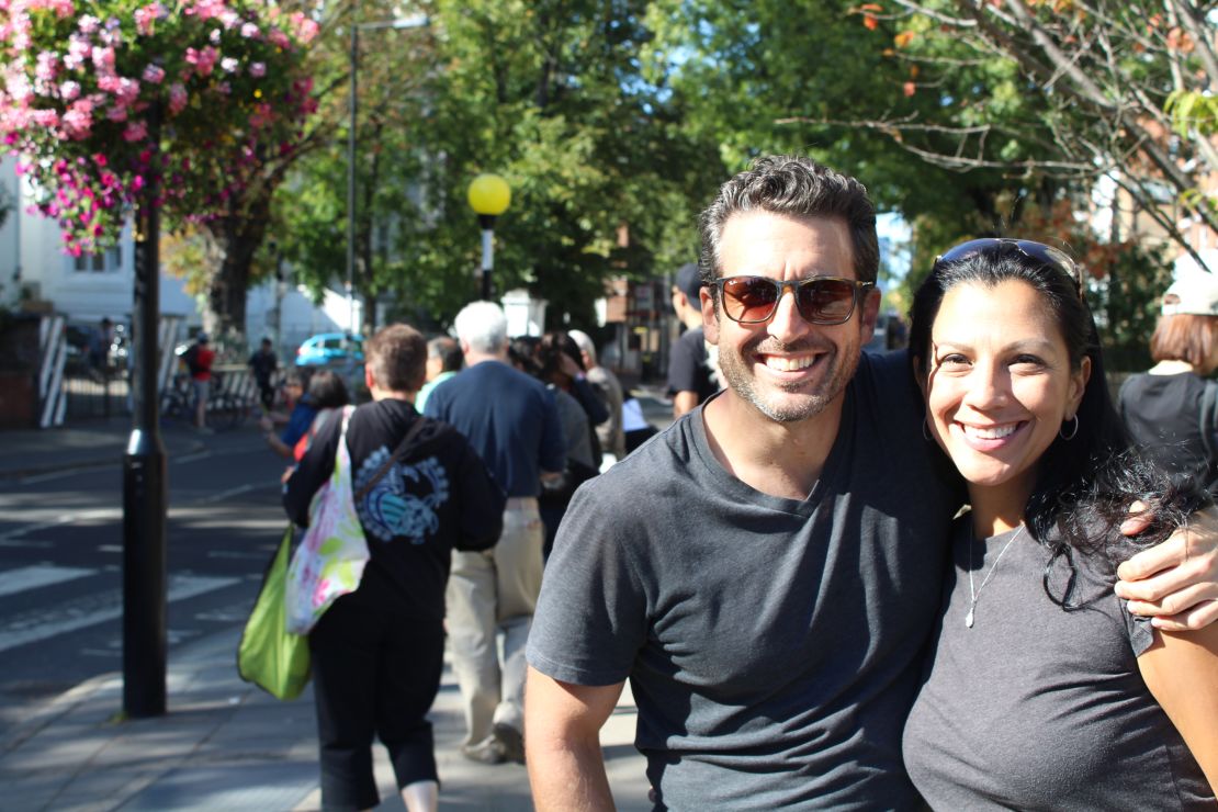 Mark and Vanessa Kramer from Orlando, Florida, enjoy Abbey Road on a sunny afternoon.