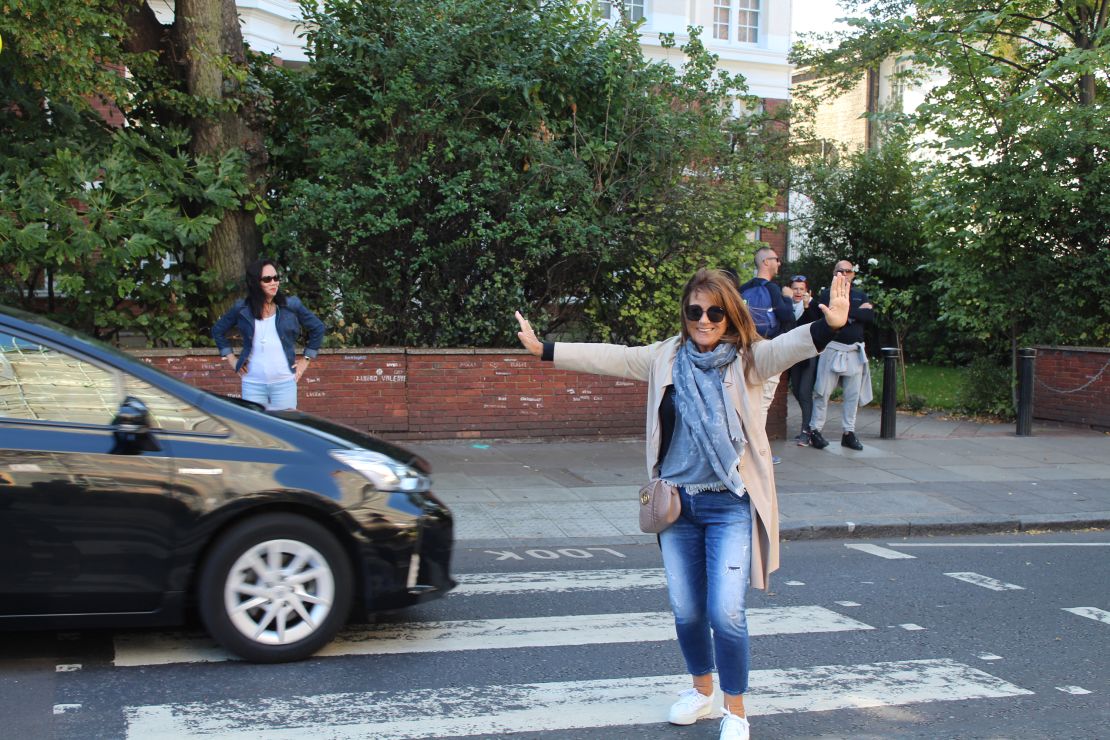 Karen Abramson, a photographer who grew up in Liverpool, poses mid-traffic.