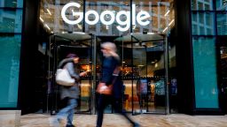 People walk past Google's UK headquarters in London on November 1, 2018. - Hundreds of employees walked out of Google's European headquarters in Dublin on Thursday as part of a global campaign over the US tech giant's handling of sexual harassment that saw similar protests in London and Singapore. (Photo by Tolga Akmen / various sources / AFP)        (Photo credit should read TOLGA AKMEN/AFP/Getty Images)