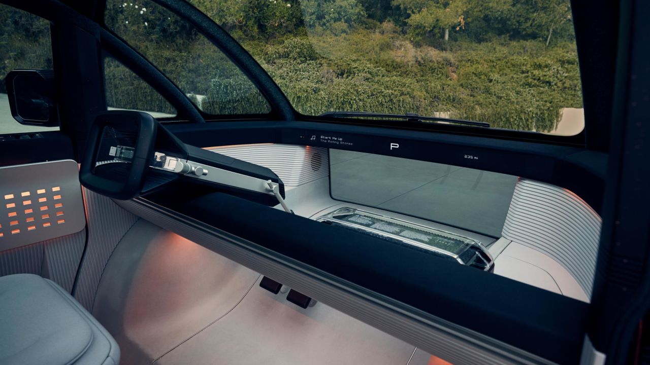 Electronic steering allows the Canoo to have a rectangular steering wheel. The driver's own mobile device will be used in place of a built-in touchscreen.