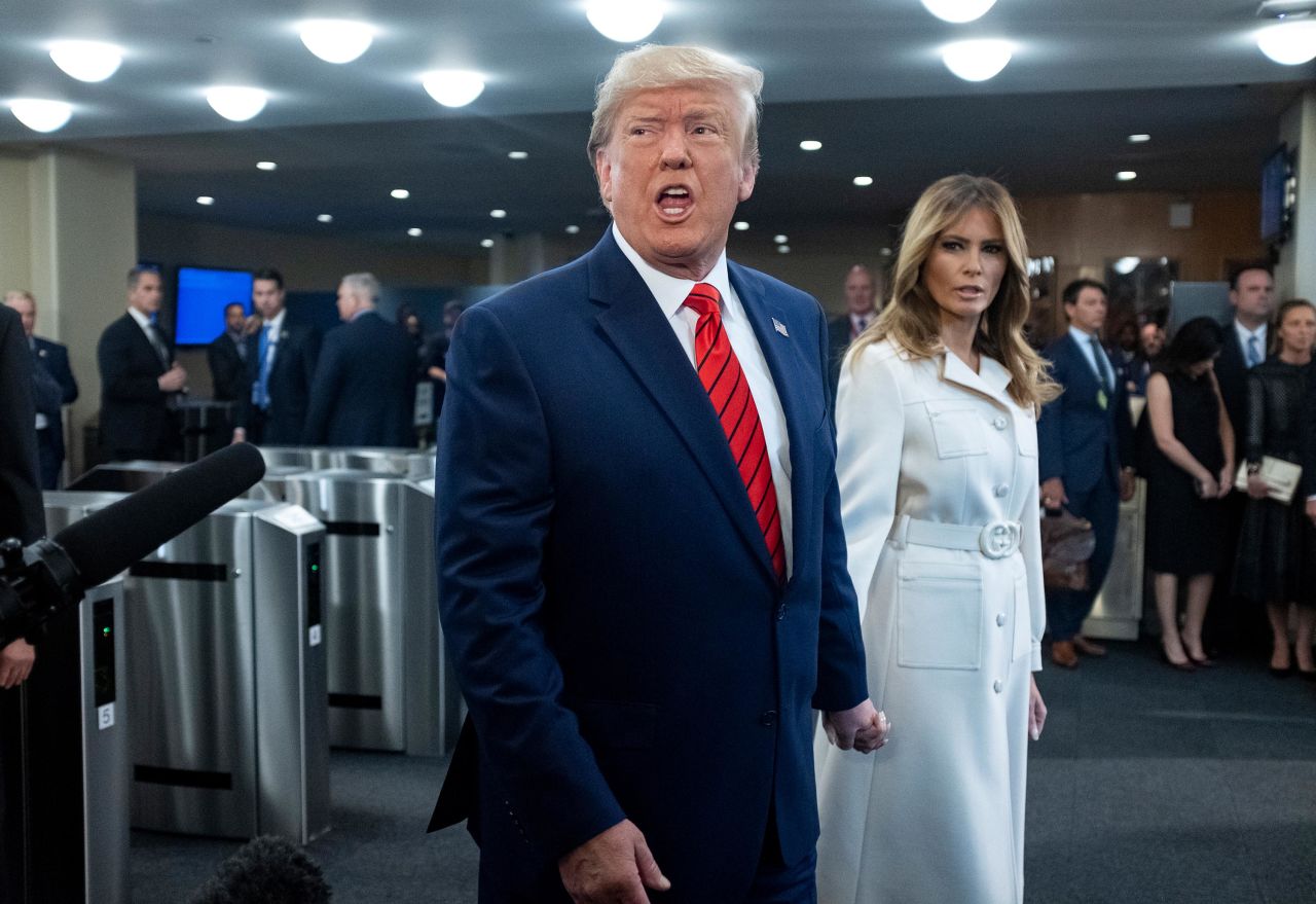 Trump addresses reporters as he arrives at the UN headquarters with first lady Melania Trump on September 24.