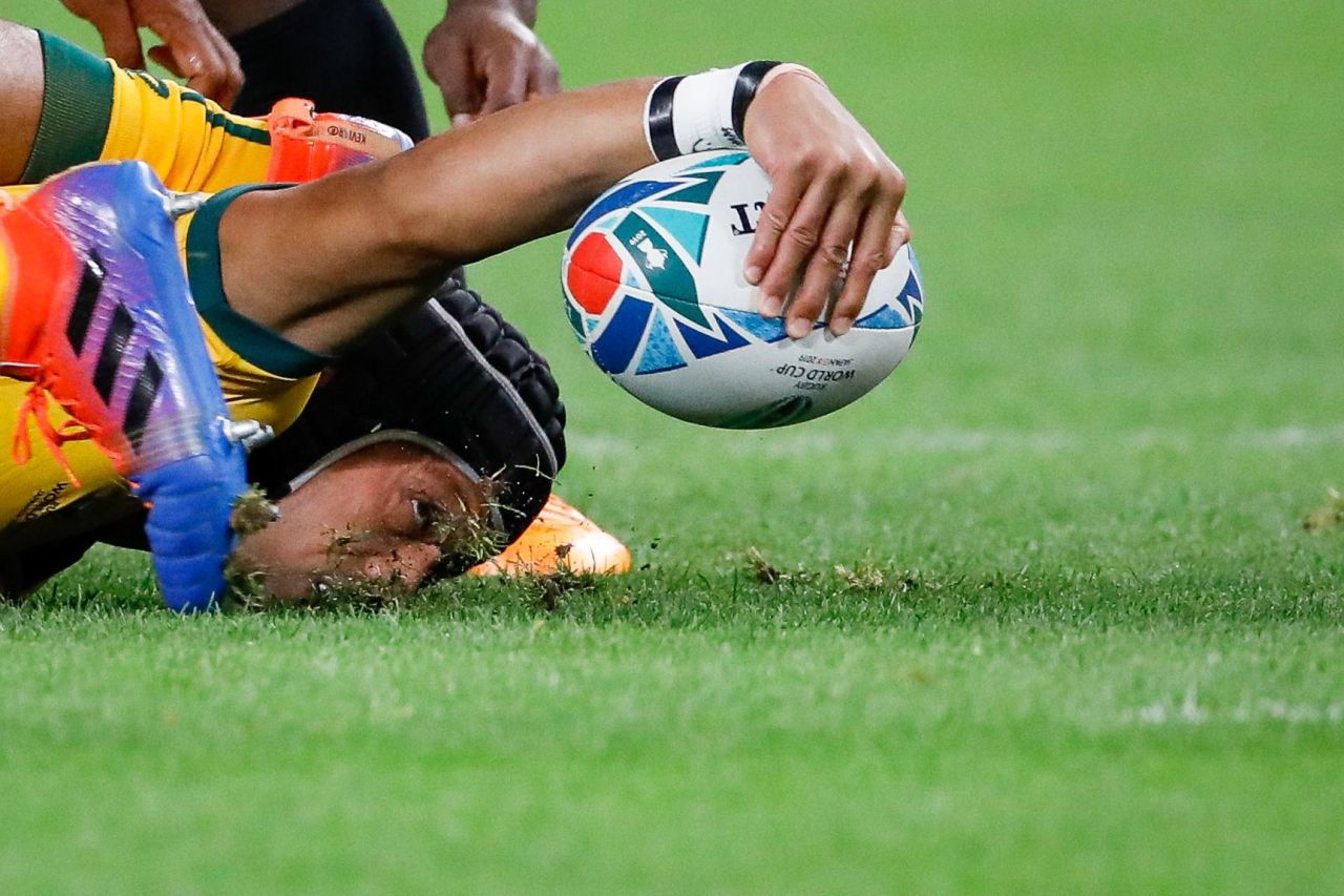 Christian Lealiifano of Australia holds on to the ball during the Rugby World Cup match between Australia and Fiji in Sapporo, Japan, on September 21.