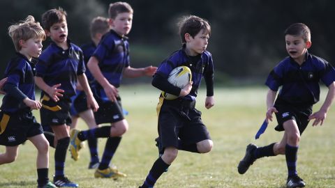 Children play rugby during an Auckland Rippa Rugby Junior Rugby match at Cox's Bay Reserve on August 5, 2017, in Auckland, New Zealand.