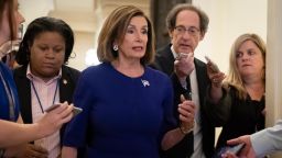 Speaker of the House Nancy Pelosi is questioned by reporters as she departs the Capitol en route to a speaking event in Washington, Tuesday, September 24, 2019. 