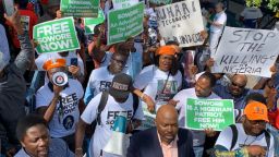This picture taken on September 24, 2019 shows protesters marching from the Nigerian House to the UN Plaza in New York calling for release of detained journalist Omoyele Sowore who has been charged with treason.