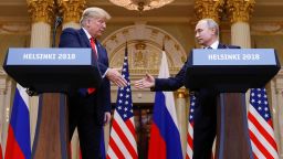U.S. President Donald Trump and Russia's President Vladimir Putin shake hands during a joint news conference after their meeting in Helsinki, Finland, July 16, 2018. 