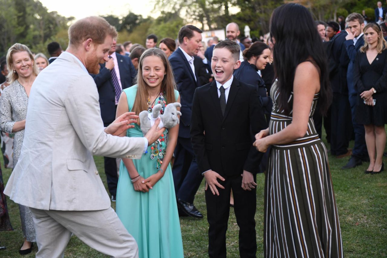 The Duke and Duchess of Sussex speak with young people in Cape Town during a reception for community and civil society leaders on Tuesday, September 24.
