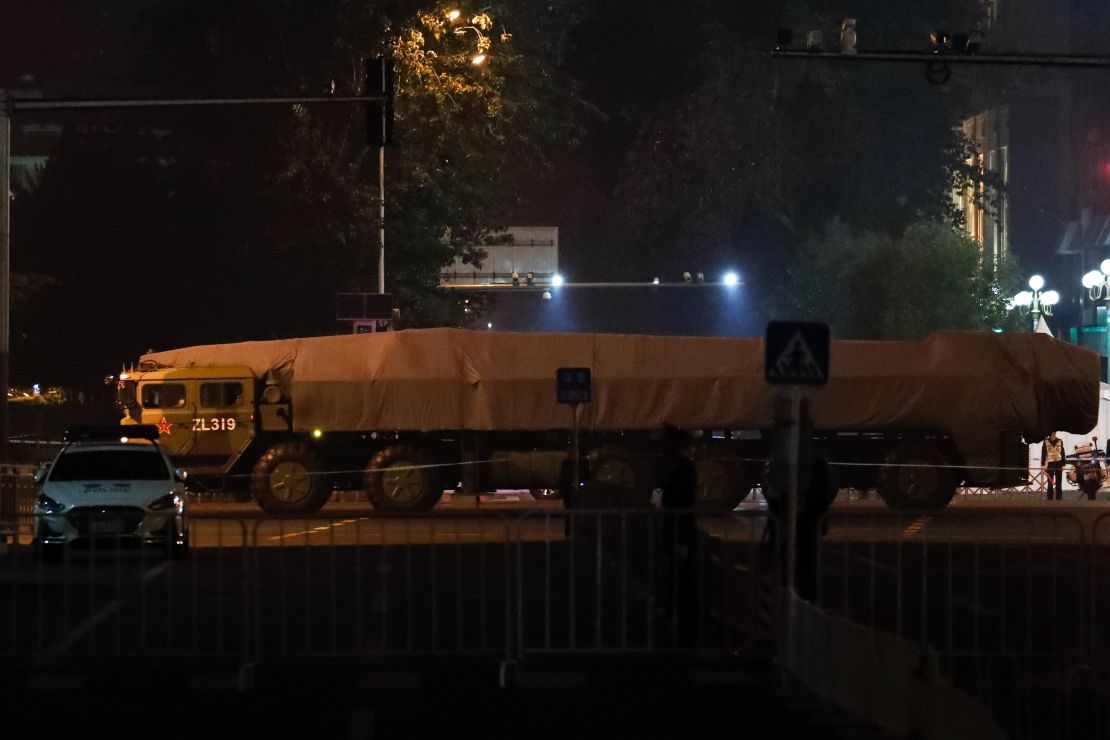 A Chinese military vehicle carrying a ballistic missile participates in rehearsals for the October 1 military parade.