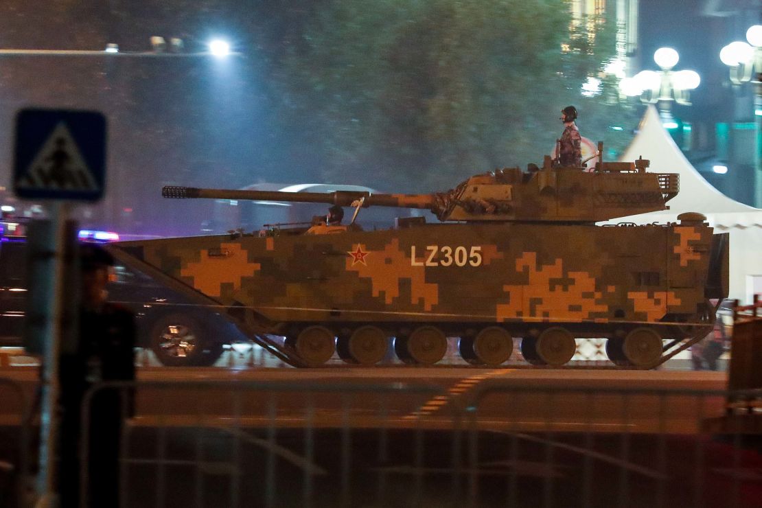 A soldier mounted on an army tank in Beijing on September 21 during rehearsals for the October 1 military parade.