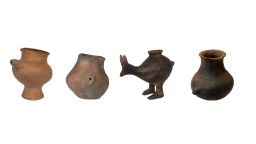 Selection of Late Bronze Age feeding vessels. Vessels are from Vienna, Oberleis, Vösendorf and Franzhausen-Kokoron (from left to right), dated to around 1200--  800 BC. Photographs were taken by Katharina Rebay-Salisbury. Katharina.Rebay-Salisbury@oeaw.ac.at