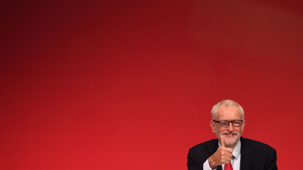 Labour leader Jeremy Corbyn gives a thumbs-up on the third day of the party's conference.