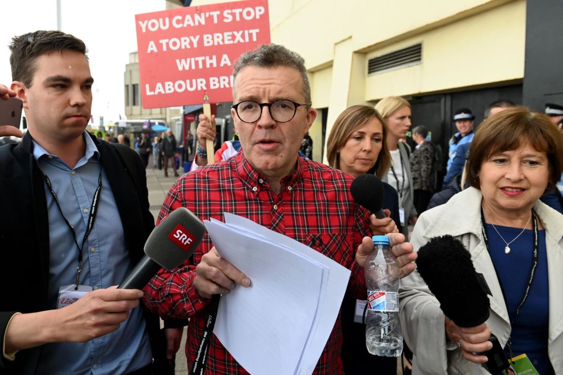 Labour deputy leader Tom Watson speaks to the media at the conference in Brighton.