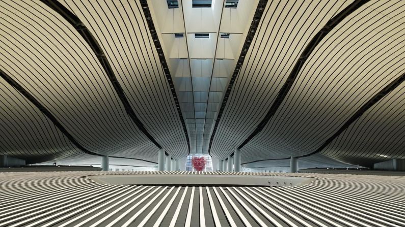 <strong>An airport for the future: </strong>Designed by the late architect Zaha Hadid and her Chinese partners, the airport has a terminal the size of 97 soccer pitches -- as well as customer-service robots that provide travelers with flight updates and airport information.
