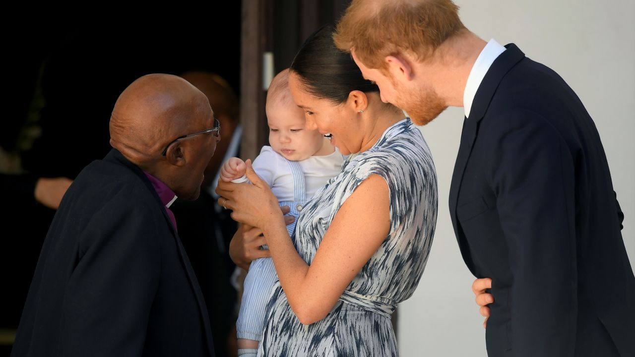 The baby appeared to hit it off with retired Archbishop and Nobel laureate Desmond Tutu.