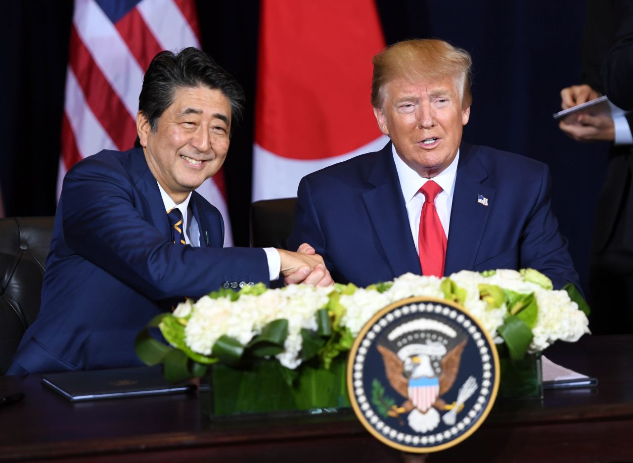 President Trump and Japanese Prime Minister Shinzo Abe shake hands after signing a trade agreement on September 25, on the sidelines of the UN General Assembly.