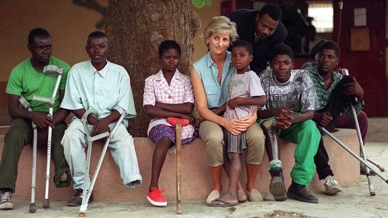 During her visit 22 years ago, the late Princess of Wales, pictured here with children injured by landmines, also visited Neves Bendinha Orthopaedic Workshop In Luanda, Angola. 