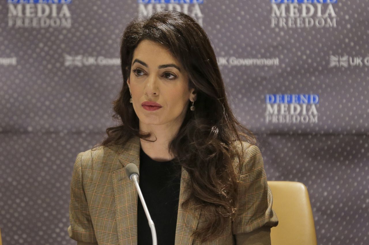 Attorney Amal Clooney listens during a panel discussion on media freedom at the United Nations headquarters September 25.