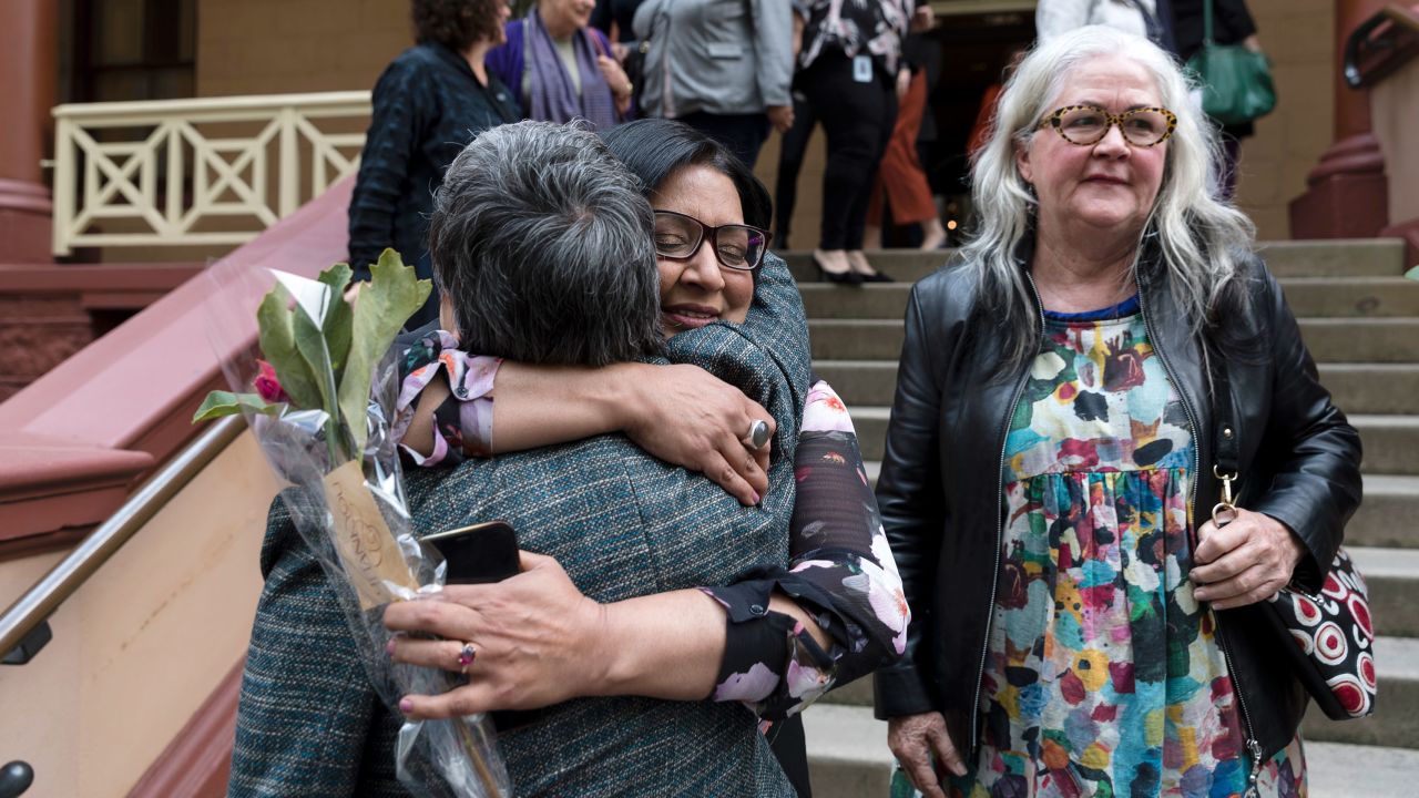 MP's Jenny Leong and Mehreen Faruqi embrace outside Parliament after the passing of the bill to decriminalize abortion on September 26, 2019 in Sydney, Australia.