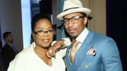 BEVERLY HILLS, CA - FEBRUARY 25: Oprah Winfrey (L) and recording artist Nick Cannon attend the 2016 ESSENCE Black Women In Hollywood awards luncheon at the Beverly Wilshire Four Seasons Hotel on February 25, 2016 in Beverly Hills, California.  (Photo by Jesse Grant/Getty Images for ESSENCE)