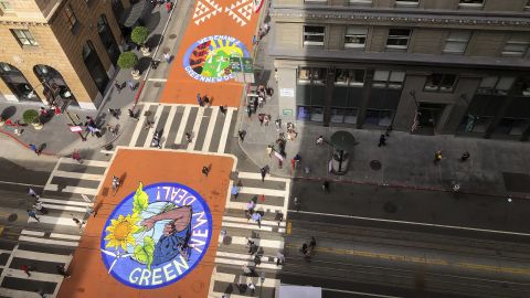 Climate activists painted murals on Montgomery Street in San Francisco.