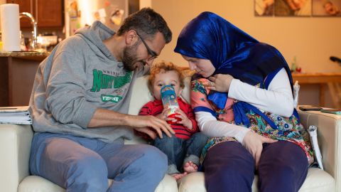 The family at home. Bubach is pregnant with their second child.