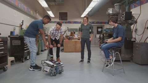 FIRST students demonstrate the capabilities of their robots.