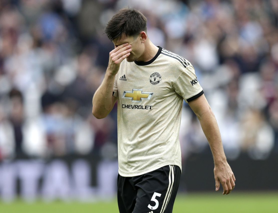 Harry Maguire of Manchester United looks dejected following the defeat at West Ham.
