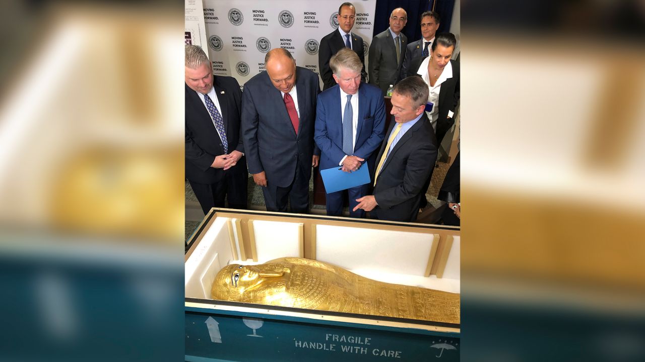 US and Egyptian officials view the coffin of Nedjemankh at a repatriation ceremony in New York.