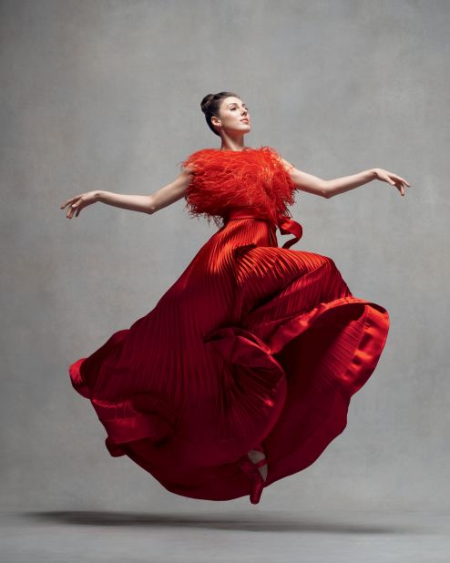 Tiler Peck of New York City Ballet wears a Valentino gown.  "Dancers have a remarkable elegance with the way they hold their bodies," Valentino said in the foreword for "The Style of Movement." "They truly carry a dress with the gentlest touch; a way that allows the dress to have freedom to move and be and carry the emotion of the movement." 