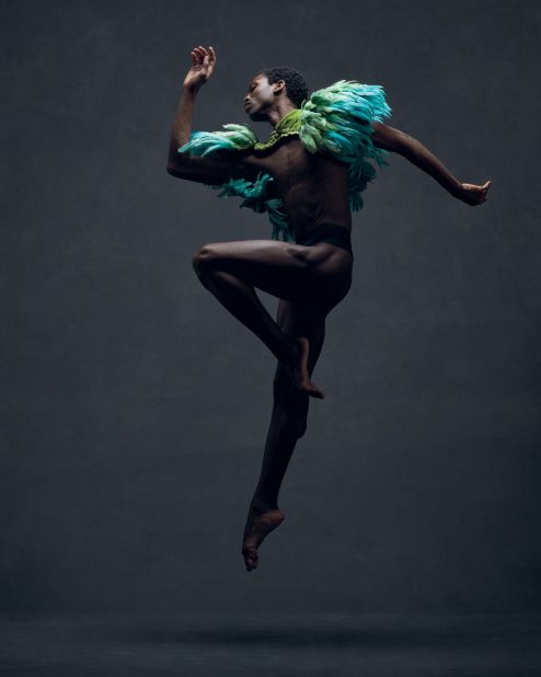 Calvin Royal III, a soloist at American Ballet Theatre, wears a vintage feathered cape by Dior. 