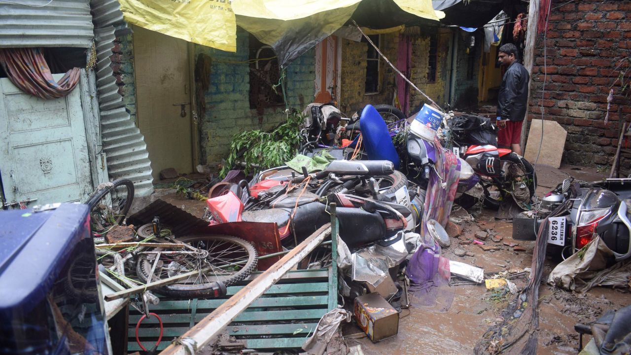 A man looks at his damaged home after flash floods in Pune, India, on September 26, 2019.