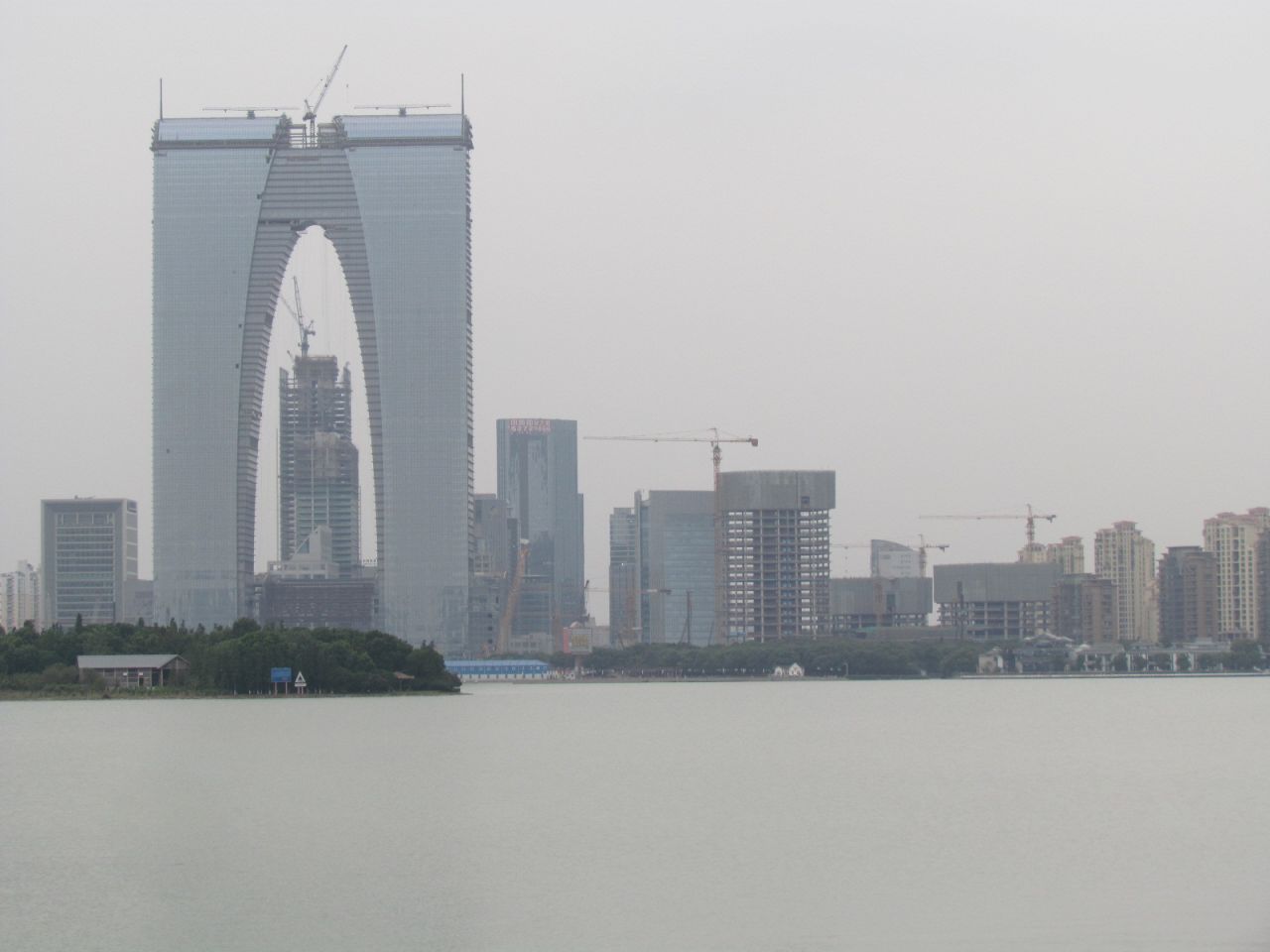 Suzhou's Gate to the East skyscraper pictured during construction in 2014.