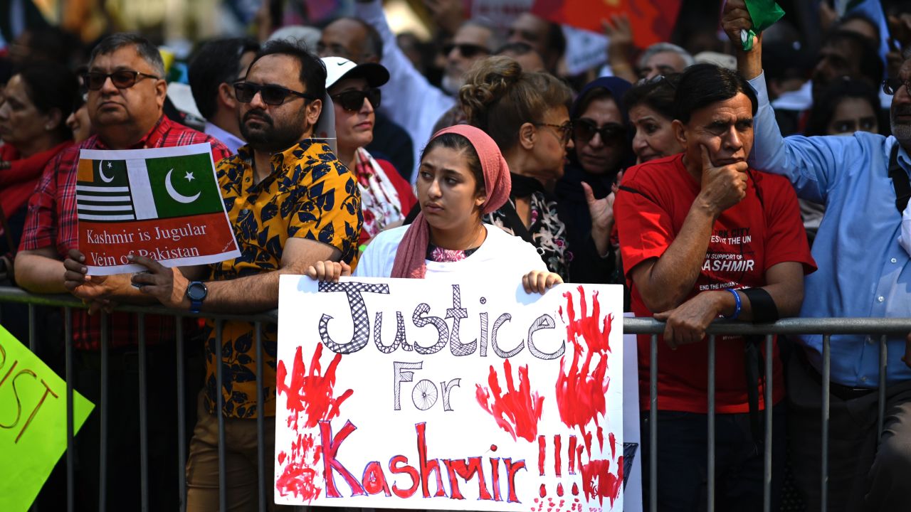 People gather during a protest in solidarity with the people of Kashmir outside the United Nations.