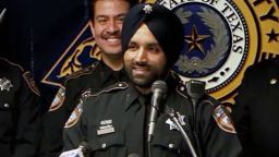 Harris County deputy Sandeep Dhaliwal was shot "from behind... at least a couple of times" while conducting a traffic stop, the sheriff said earlier Friday a news conference.