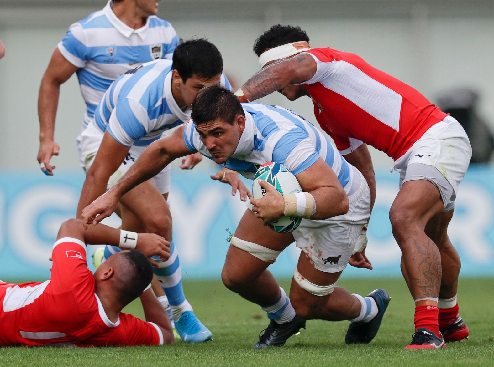 Argentina's Pablo Matera runs with the ball during their game against Tonga.