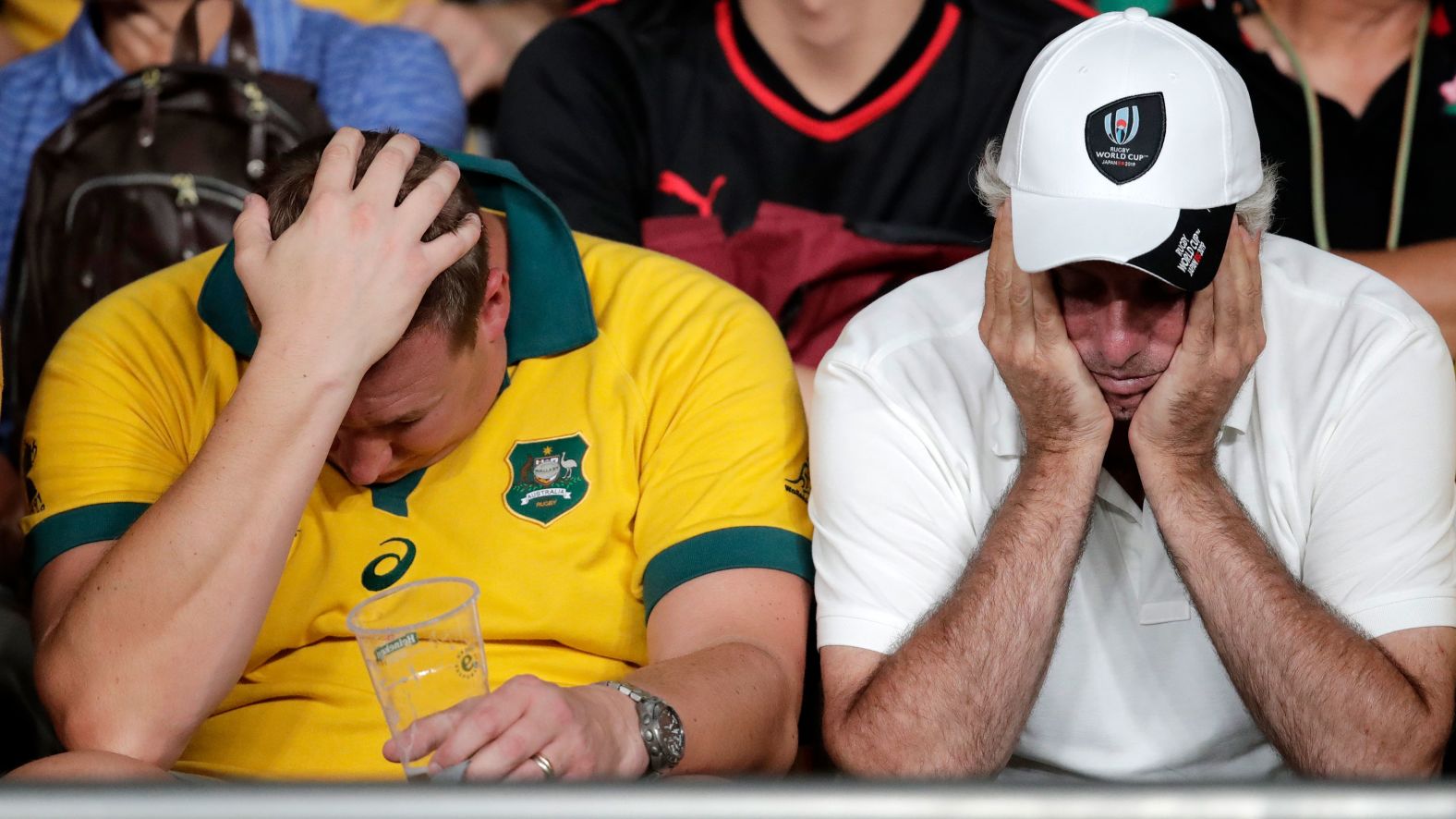 Australian supporters react following the Rugby World Cup Pool D game defeat to Wales in Tokyo.