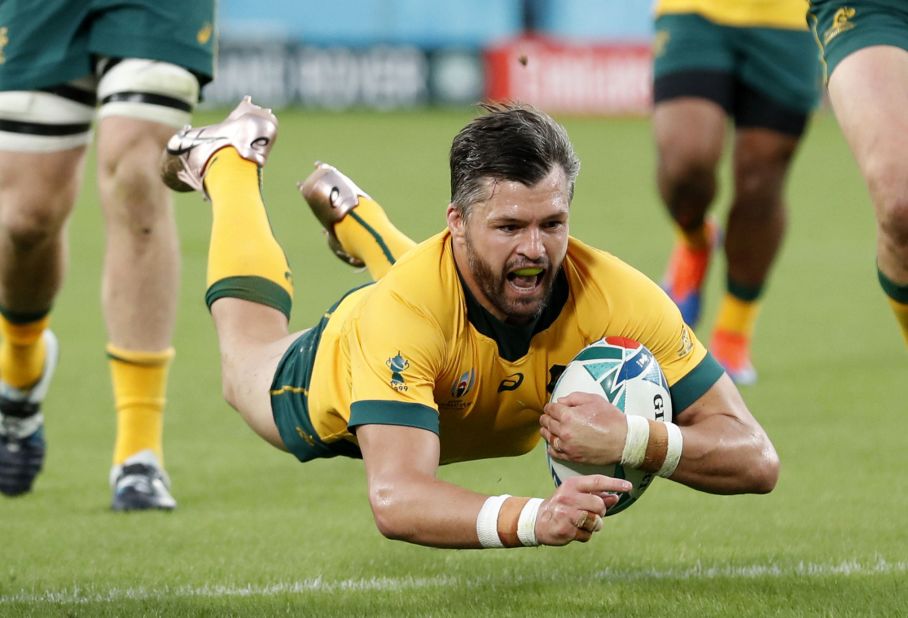 Adam Ashley-Cooper of Australia scores the first half try to drag his side back into contention against Wales after a slow start for the Wallabies. 