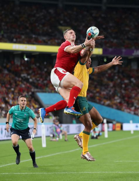 George North of Wales and Kurtley Beale of Australia jump for the ball in the Tokyo Stadium.