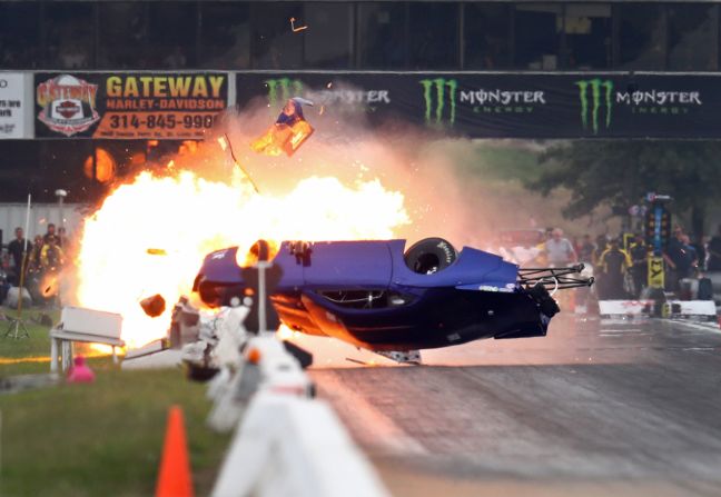 The car of NHRA pro mod driver Rick Hord bursts into flames as he crashes during qualifying for the Midwest Nationals at World Wide Technology Raceway. Hord was not  injured.