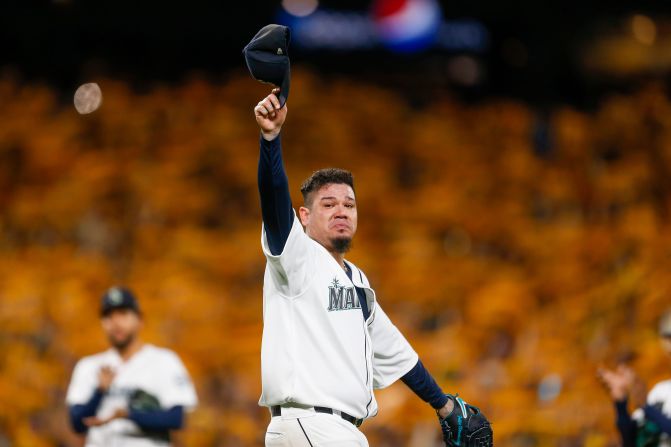 Seattle Mariners pitcher Felix Hernandez waves his cap to cheering fans during a game against the Oakland Athletics in Seattle, Washington, on September 26. Hernandez received a <a href="index.php?page=&url=https%3A%2F%2Fbleacherreport.com%2Farticles%2F2855499-watch-felix-hernandez-get-emotional-ovation-after-likely-final-mariners-start" target="_blank" target="_blank">standing ovation</a> from the crowd after leaving the mound in the fifth inning for what was likely his final start as a Mariner. Hernandez has been with the team since 2005.