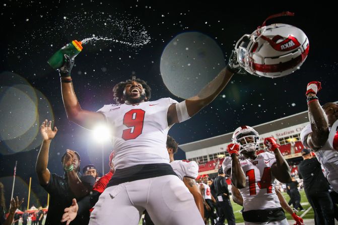Malik Staples of Western Kentucky University celebrates with his teammates after winning their NCAA football game over the University of Alabama Birmingham in Bowling Green, Kentucky, on September 28.