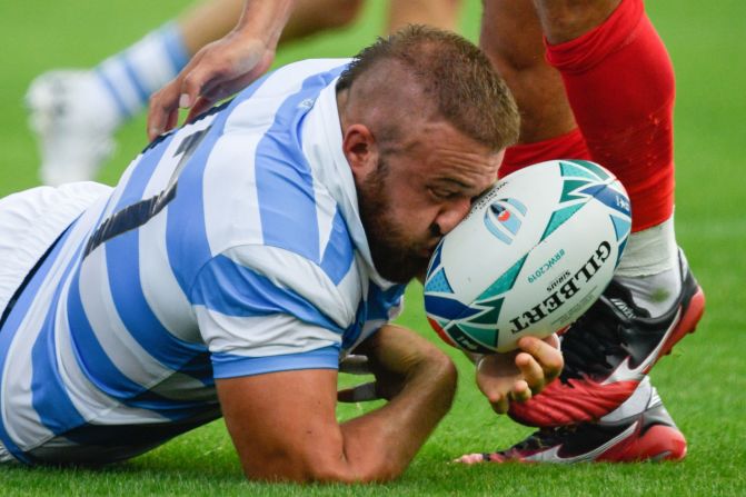 Argentina's prop Mayco Vivas is hit in the face by the ball during the World Cup Pool C match between Argentina and Tonga at the Hanazono Rugby Stadium in Higashiosaka, Japan, on September 28.