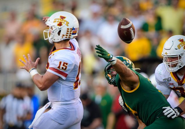 Baylor Bears defensive end James Lockhart strips the ball away from Iowa State Cyclones quarterback Brock Purdy during their NCAA football game in Waco, Texas, on September 28.