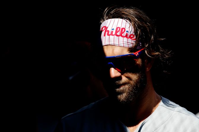 Philadelphia Phillies right fielder Bryce Harper stands in the dugout prior to the Phillies' game against the Washington Nationals at Nationals Park in Washington, D.C., on September 24.