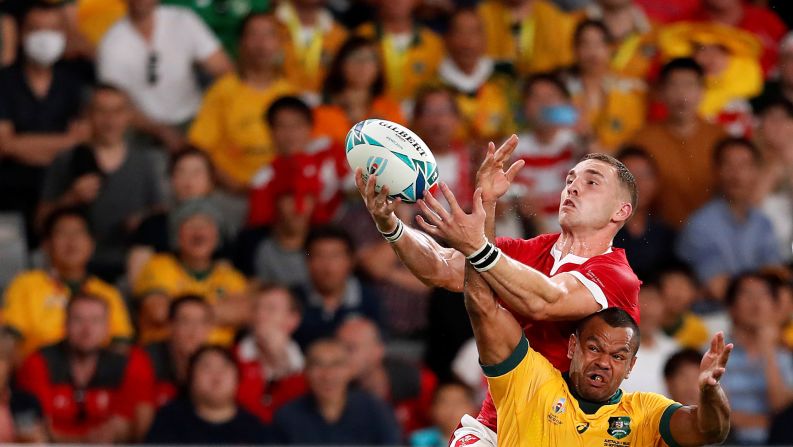 Wales' George North competes for the ball with Australia's Kurtley Beale during their Rugby World Cup match in Tokyo on September 29.