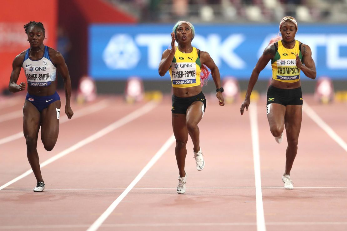 Fraser-Pryce held off the challenge of Britain's Dina Asher-Smith (L)